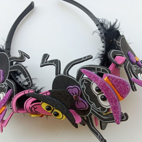Children's Halloween headband used with spiders and feathers