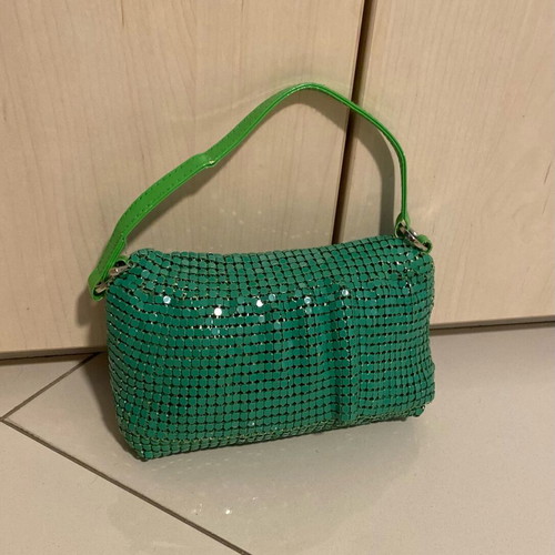 Migato green hand bag like new, satin interior