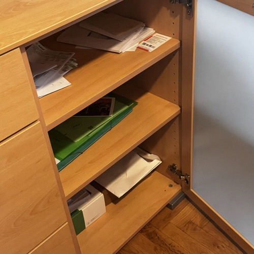 Wooden living room or bedroom furniture with drawers and cabinets