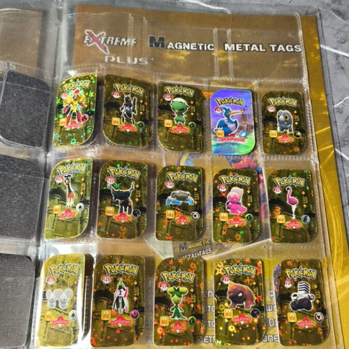 Pokemon metal tags used from collection pack