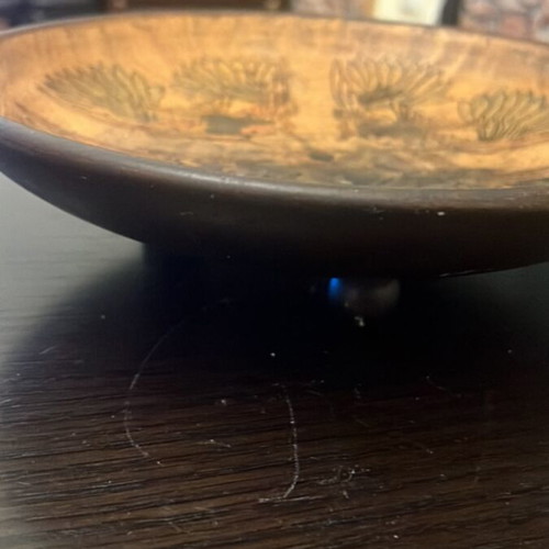 Handmade wooden bowl used with embossed bird decoration