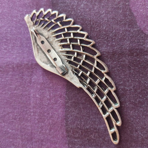 Feather brooch new with turquoise enamel and silver details