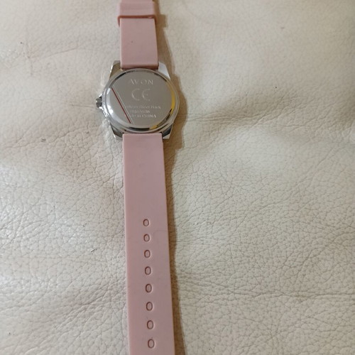 Avon women's watch like new with pink silicone strap and rhinestones