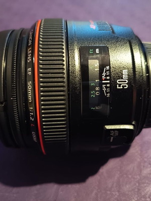 Canon EF 50mm f/1.2L USM lens new with 2 NiSi filters