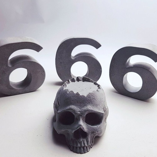 Handmade concrete skull decoration, gothic style