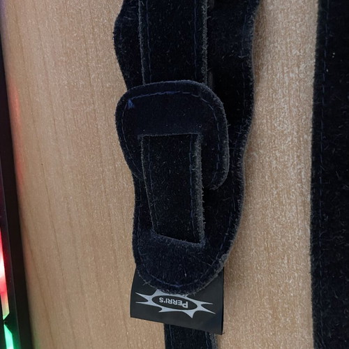 Perri’s leather guitar strap