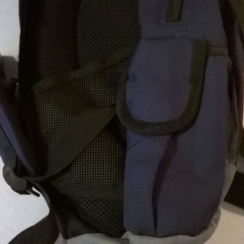 Backpack used with pockets and rain protection