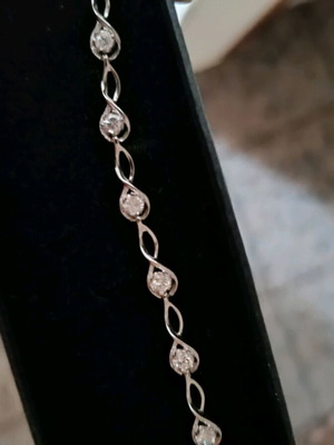Silver bracelet with stones new, white and silver