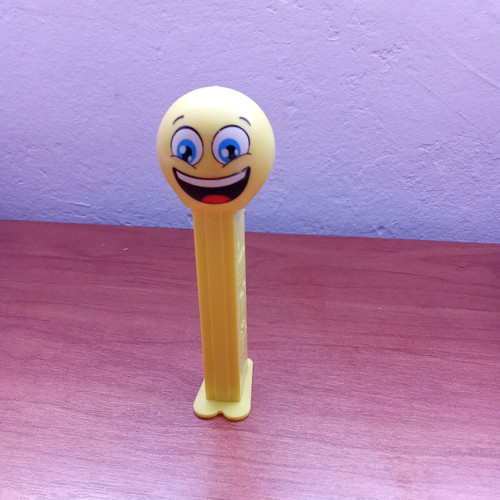 Pez candy pack with Happy Face dispenser used, rare collectible
