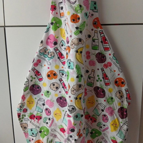 Cooking apron with colorful designs like new