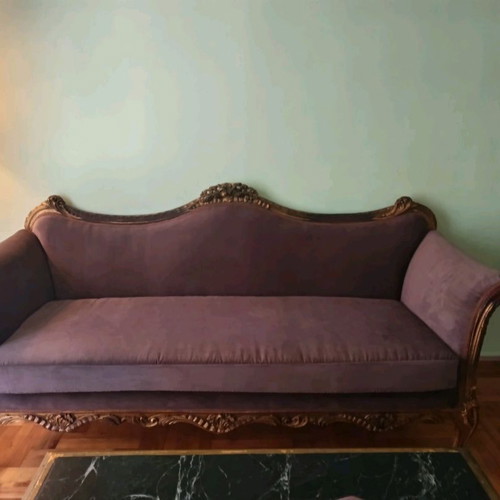 Three-seater sofa with light brown velvet upholstery
