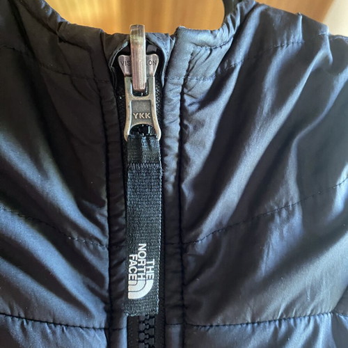 The North Face jacket used, reversible, size S, black and gray