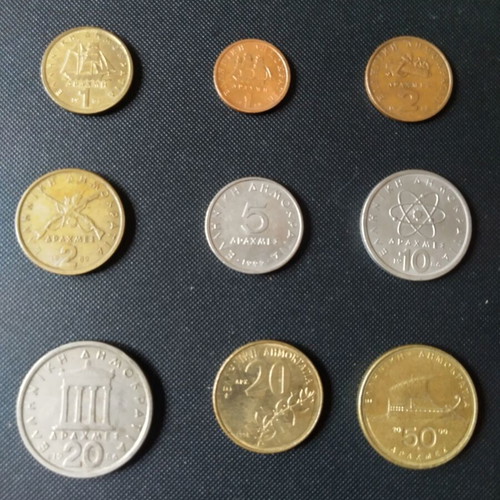 Set of nine used drachma coins