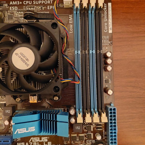 Asus M5A78L LE motherboard with AMD FX 6300 6-core CPU and stock cooler like new
