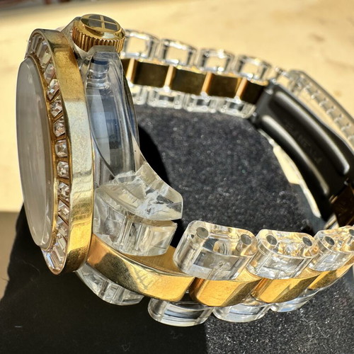 Watch with iridescent crystals like new, zircon and gold