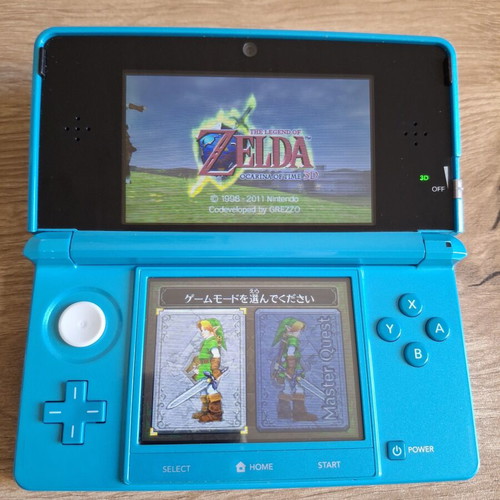 Nintendo 3DS Coral Blue like new with original stylus and USB cable