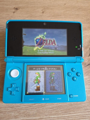 Nintendo 3DS Coral Blue like new with original stylus and USB cable