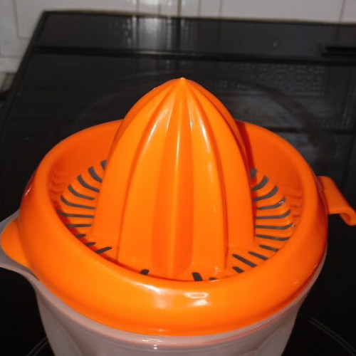Lemon squeezer and glass new, orange color set