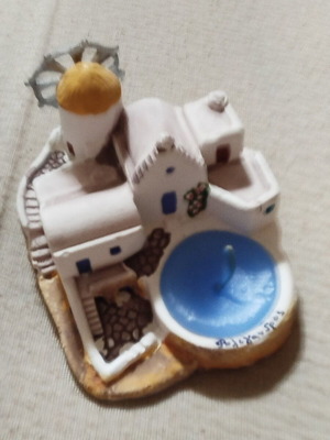 Table souvenir candle like new, island-themed