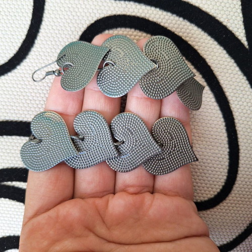 Metal heart earrings like new, gray