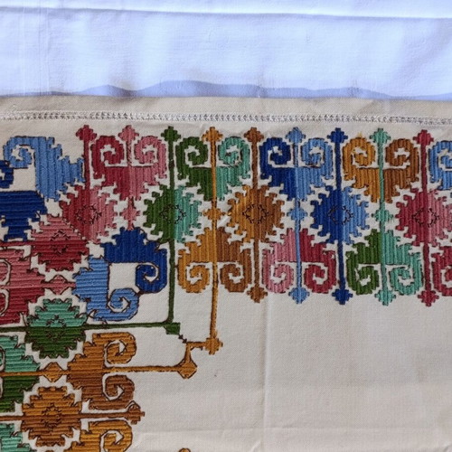 Handmade table runner used, traditional colorful geometric embroidery