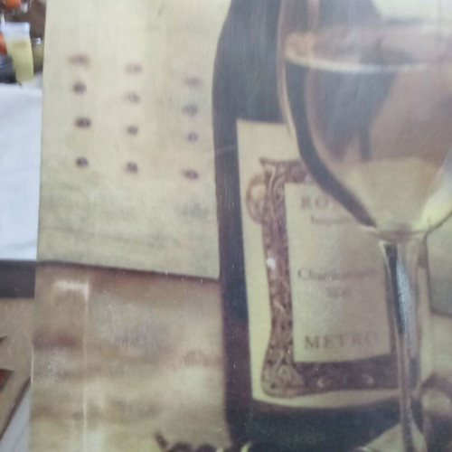 Canvas painting with wine theme used
