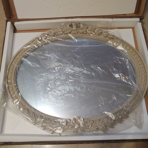 Oval mirror with decorative baroque frame, ecru beige
