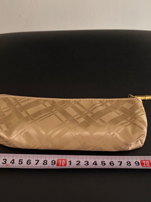 Estée Lauder toiletry bag new, gold color