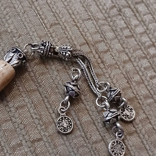 Worry beads made of bone used with oriental elements