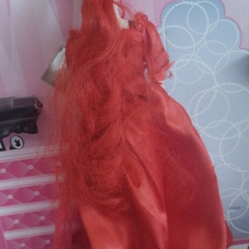 Barbie Colour Reveal doll with red dress
