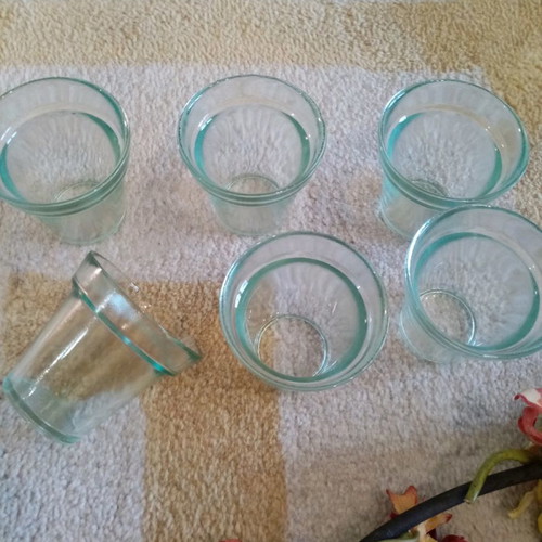 Decorative metal wreath like new with glass candle holders