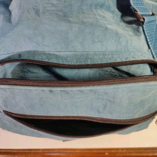 Large Enrico Benetti suitcase used with wheels and hard base blue