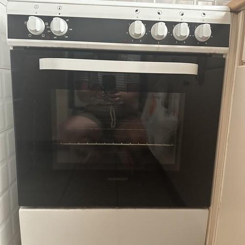 Telefunken electric stove used, white with glass oven door