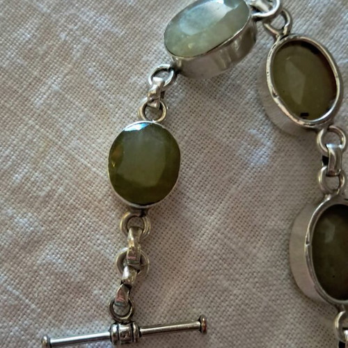 Silver bracelet with genuine green stones, like new