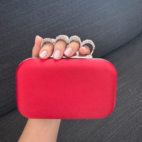 Red clutch like new with decorative clasp and chain
