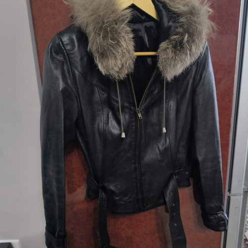 Leather jacket with genuine fur collar