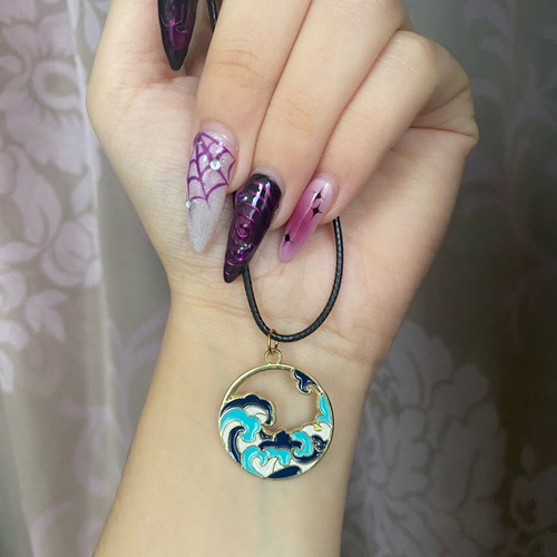The Wave unisex necklace new with black cord