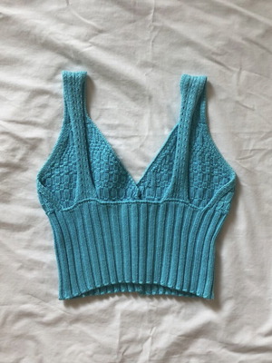 Knitted blue top used, missing one button