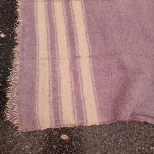 Vintage wool woven used in soft purple shade