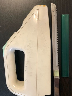 Moulinex electric knife used with worn yellow rubber