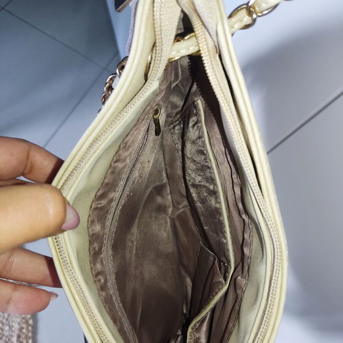 Shoulder bag with fringes and gold details, like new, beige suede leather