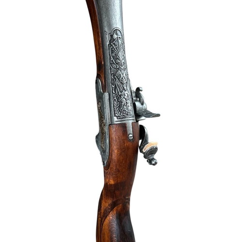 Decorative blunderbuss flintlock pistol used with wooden stock