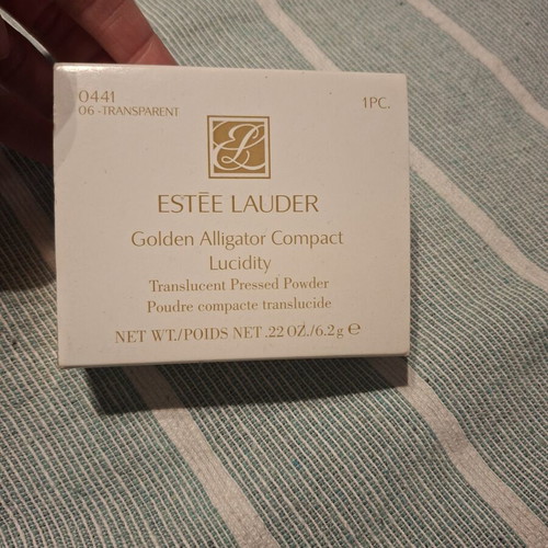 Estee Lauder collectible powder new with gold alligator case