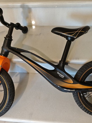 Lionelo Bart Air balance bike used, black orange