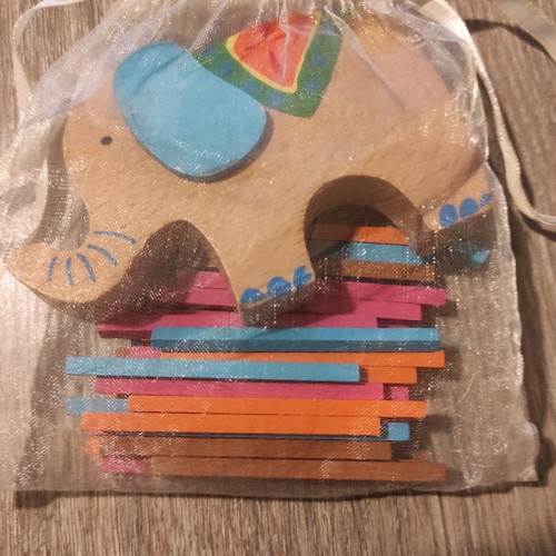 Wooden balance game used with elephant