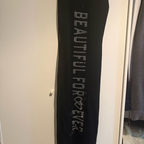 Sleeveless black dress like new with back slit, size S