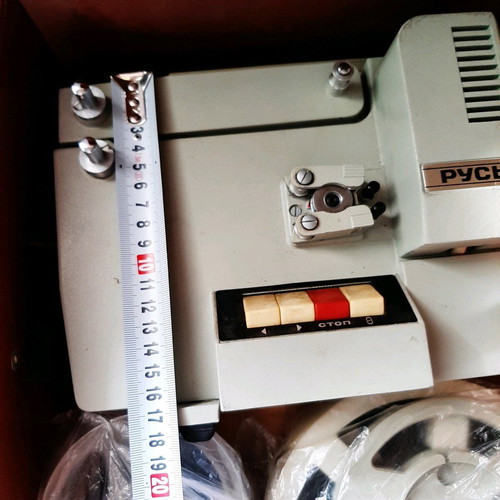 Russian projector used with leather case and film