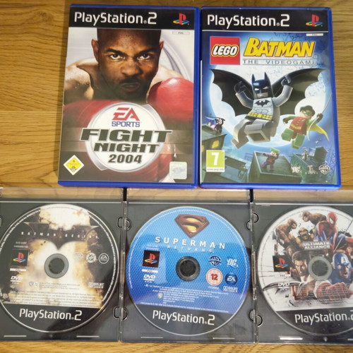 Sony PlayStation 2 Slim 9000X console bundle with 5 games, controller, memory card, cables