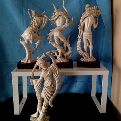 Asian figurines used, resin or plastic, set of 4