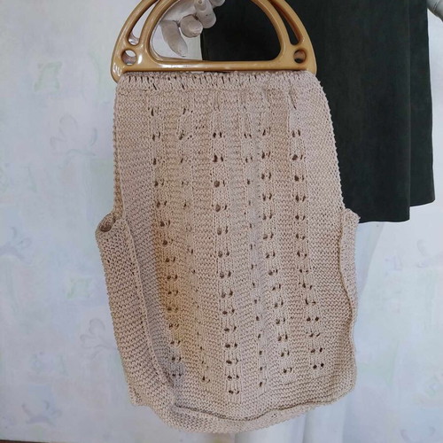 Woven market bag like new with plastic handles beige